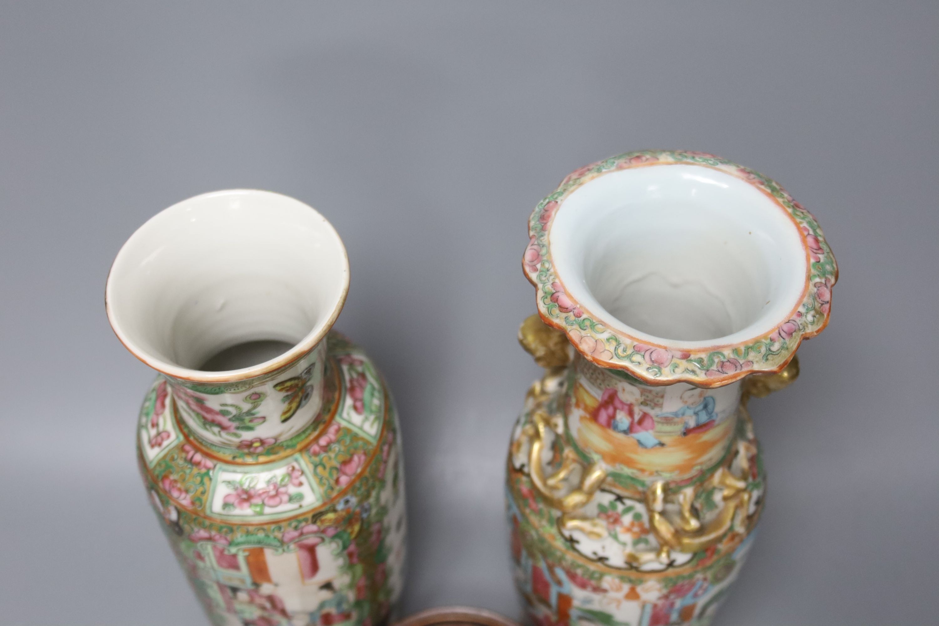 Two Chinese famille rose vases, late 19th century, tallest 26 cm, one wood stand, some restoration